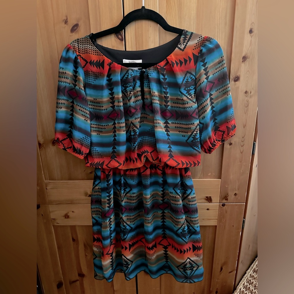 Cute western style dress! Beautiful colors and lightweight!